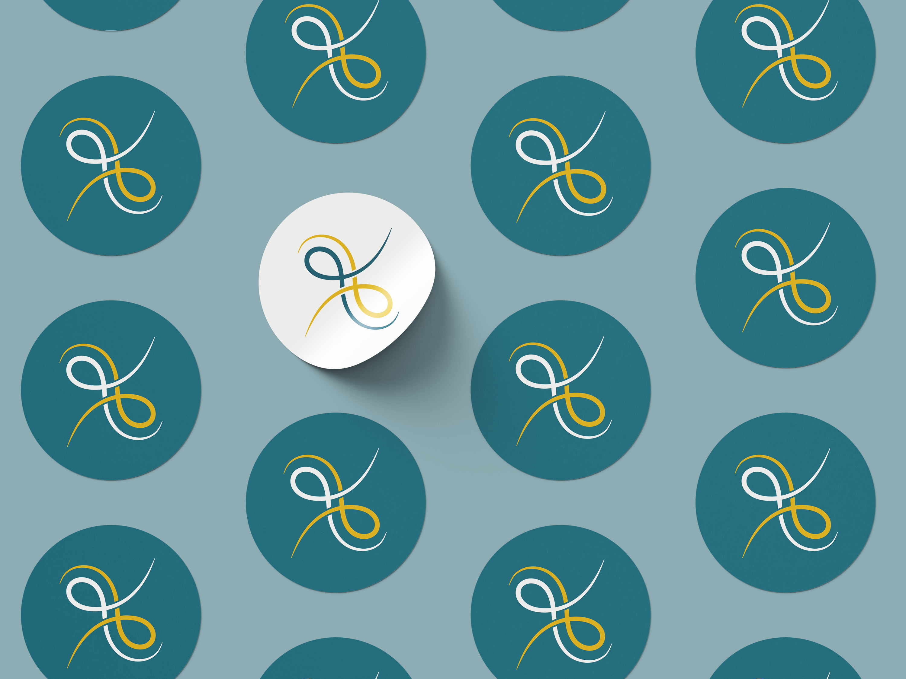 DRA symbol repeated across a sticker pattern